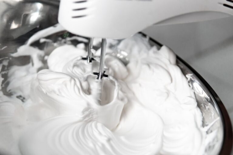 Mixing Homemade Whipped Frosting in a Bowl