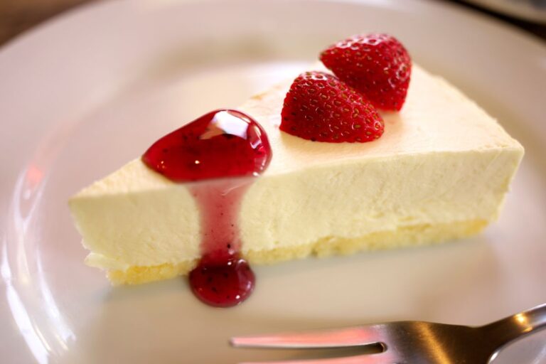 Slice of No Bake Cheesecake Topped with Strawberries