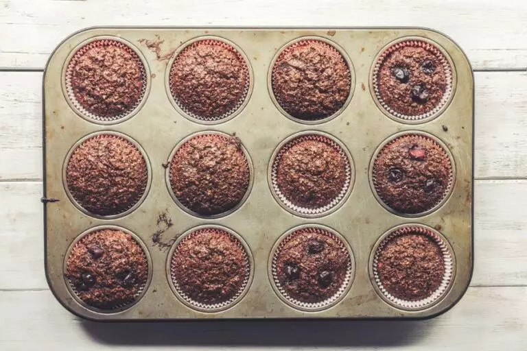 Chocolate Bran Muffins With Cherries in Muffin Pan