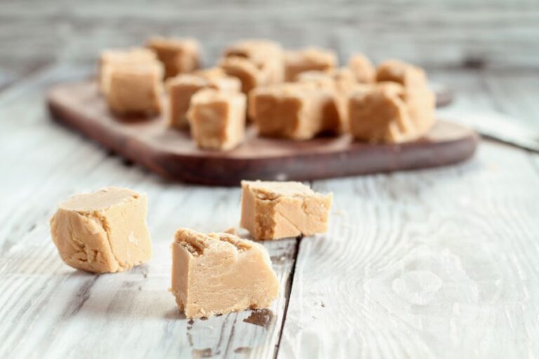 Homemade Peanut Butter Fudge on Wooden Table