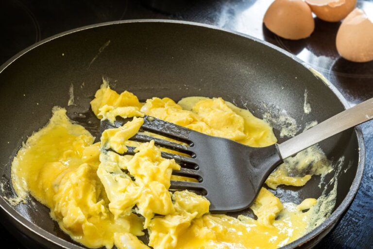 Scrambling Eggs in a Black Pan