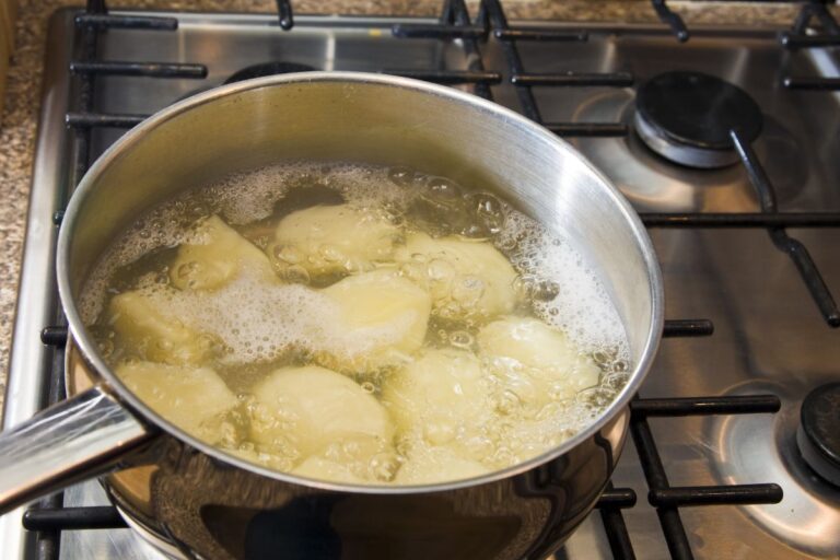 Boiling Potatoes in a Pot on the Stove