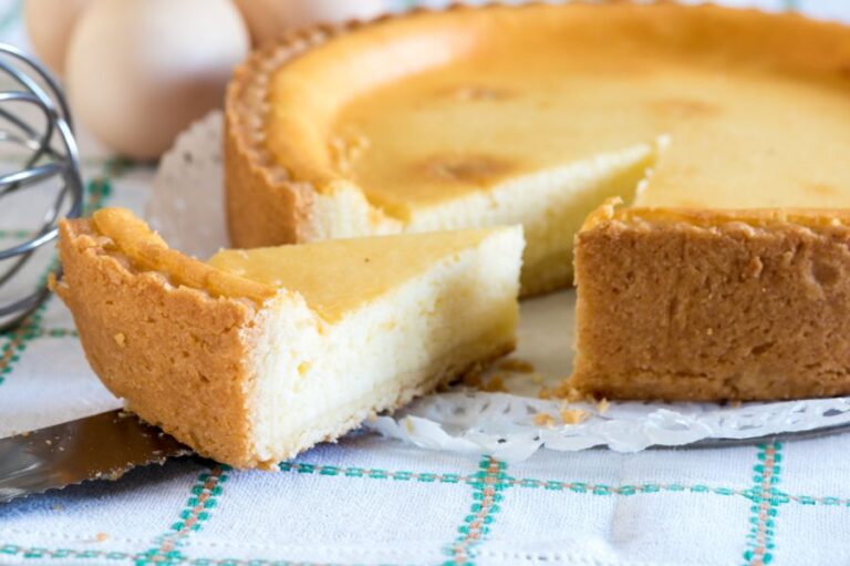 Slice Removed From Homemade Cheesecake