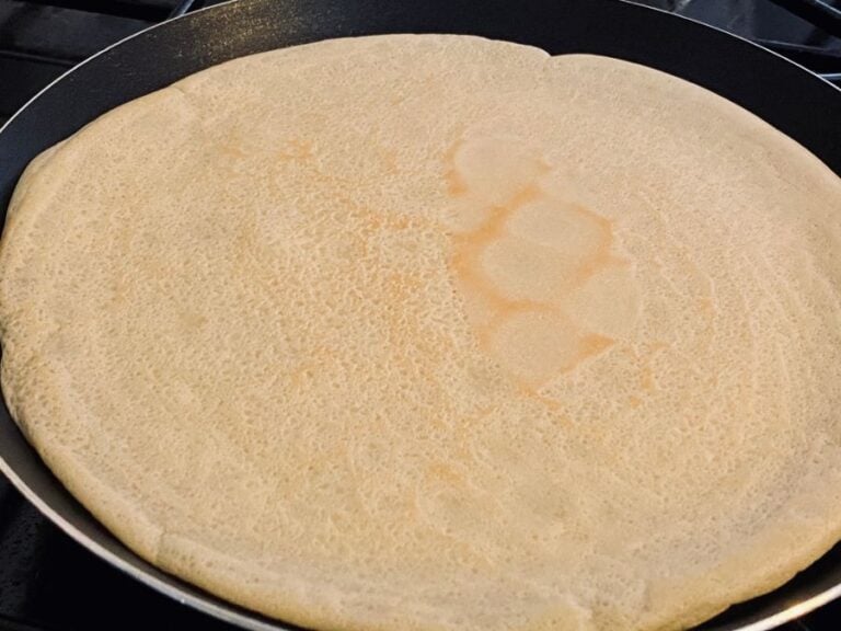 Light French Pancake in the Process of Being Cooked