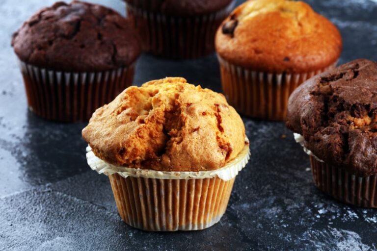 Chocolate and Nut Muffins on a Table