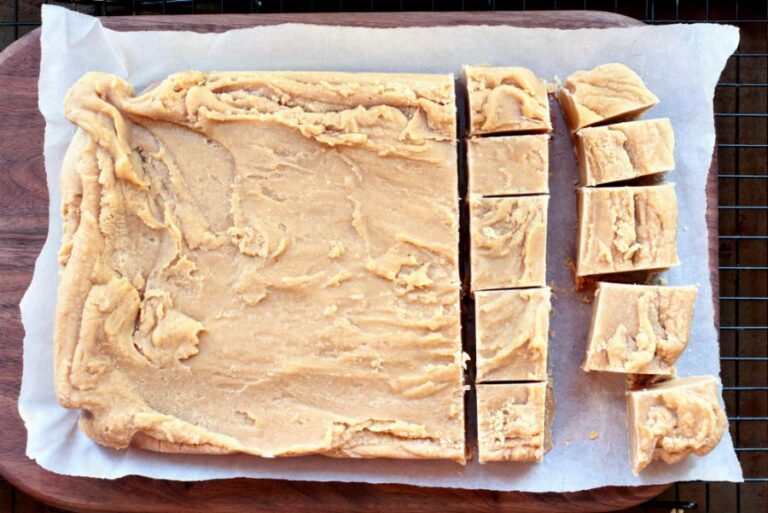 Large Block of Peanut Butter Fudge Being Cut