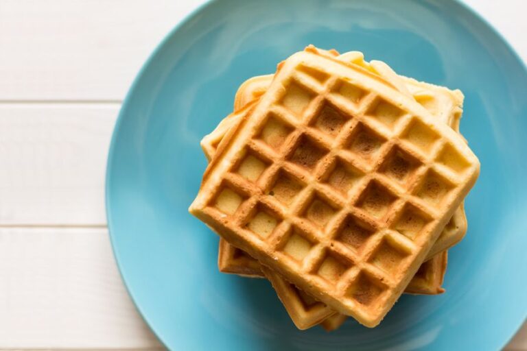 Stack of Belgian Waffles on Blue Plate