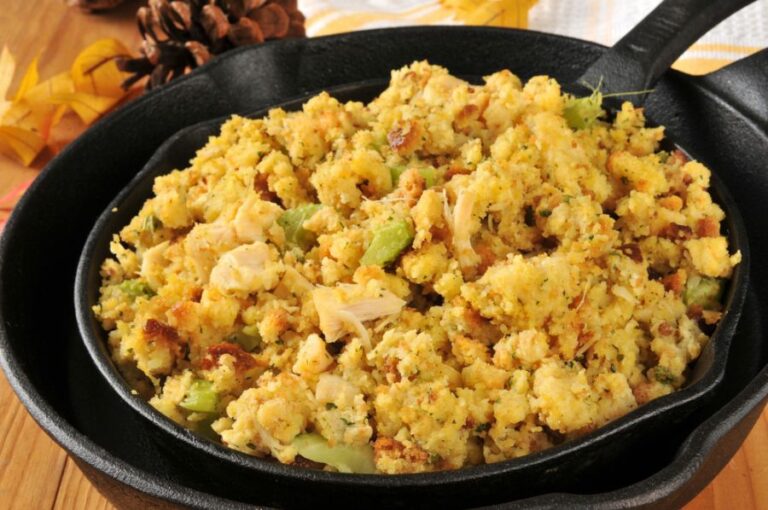 Cornbread Stuffing With Chunks of Turkey in a Cast Iron Skillet