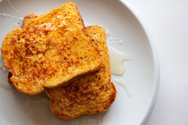 French Toast With Maple Syrup on a White Plate