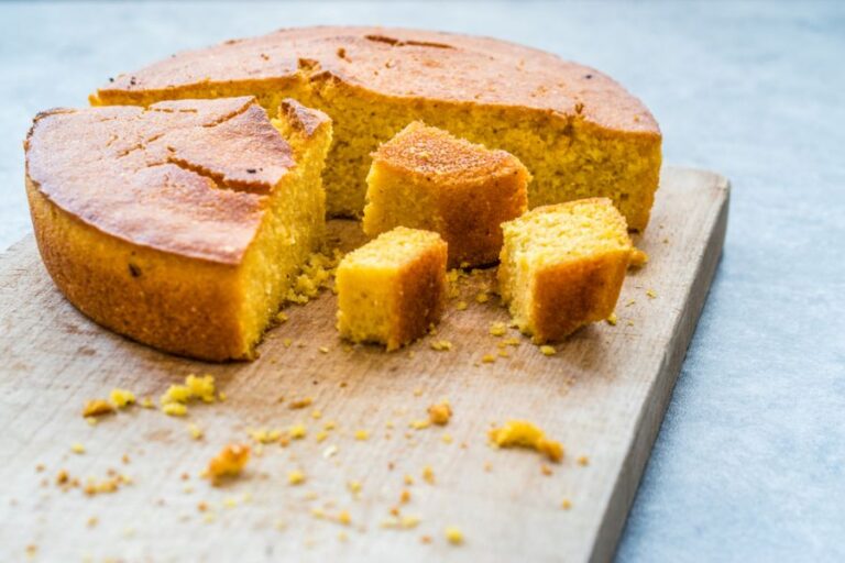 Fresh Fluffy Cornbread Cut on a Cutting Board
