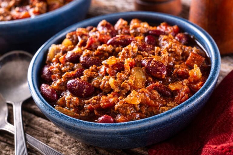 Hot Chili in a Blue Bowl on the Table