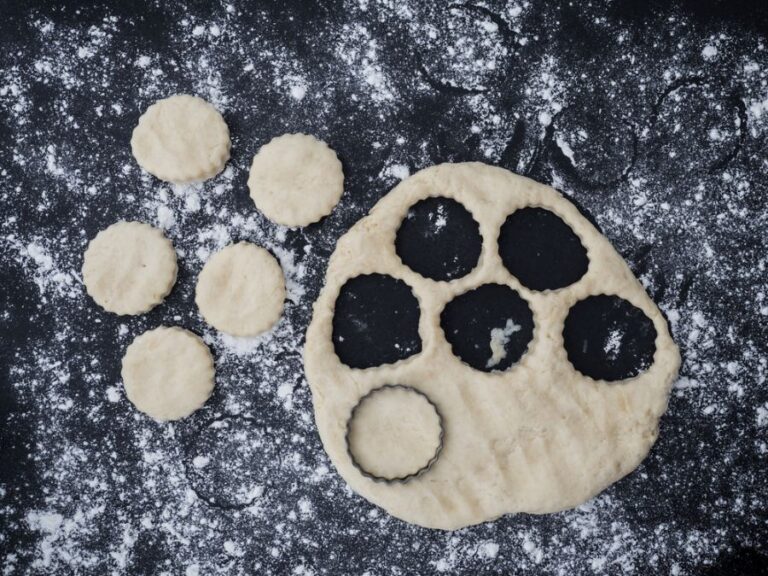 Handmade Dough for Scones Being Cut on Slate