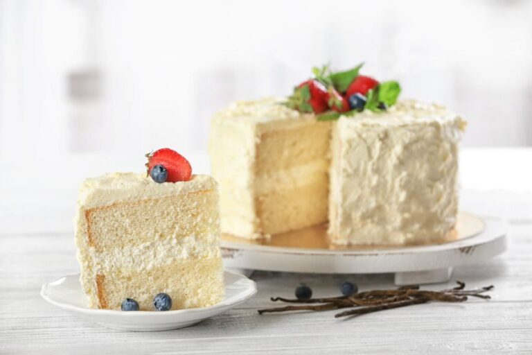 Sliced Vanilla Cake With Fresh Berries on Top