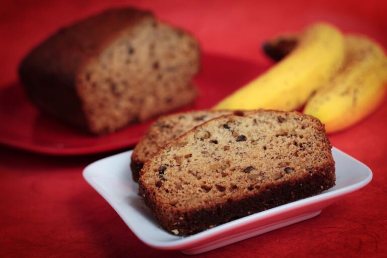 Banana Bread Cut and Served on a White Plate