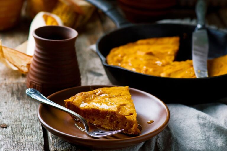 Piece of Pumpkin Skillet Cornbread on a Brown Plate