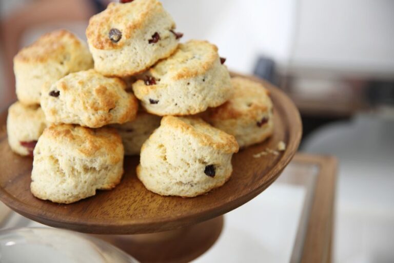 Stack of Round Scones on a Wooden Cake Plate