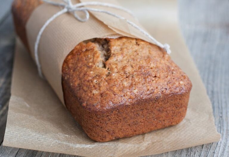Fresh Loaf of Banana Bread Wrapped With Baking Paper and String