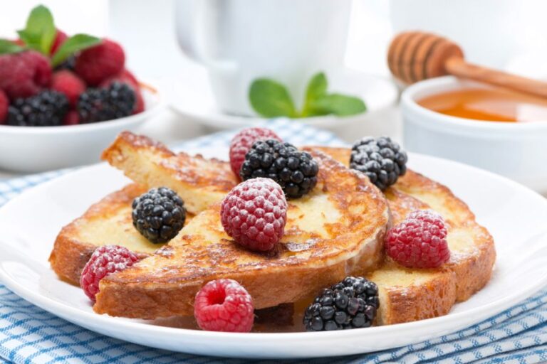 French Toast With Fresh Fruit and Powdered Sugar