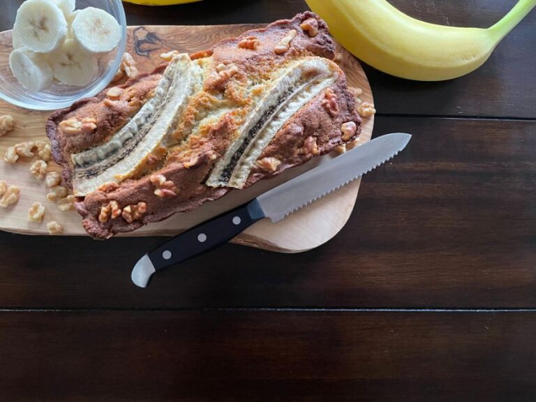 Fresh Baked Banana Bread With Nuts and Sliced Bananas