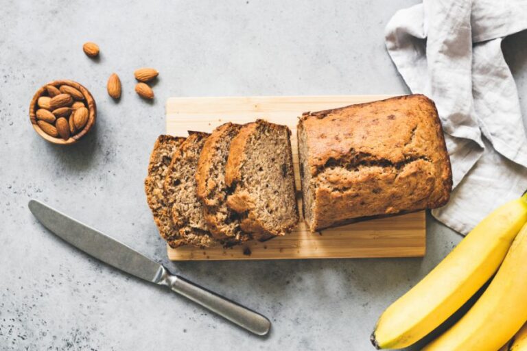 Gluten Free Banana Bread Sliced on a Cutting Board