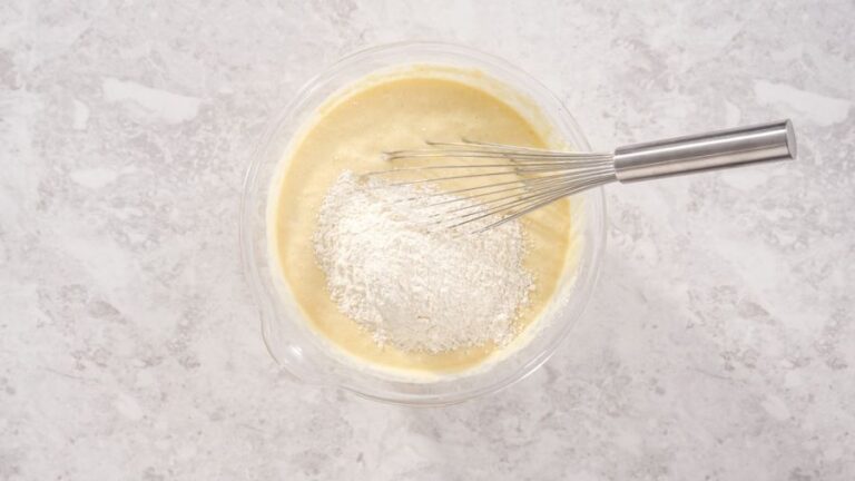 Mixing Pancake Mix Into Wet Ingredients for Banana Bread