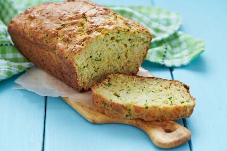 Fluffy Sliced Zucchini Bread on a Cutting Board