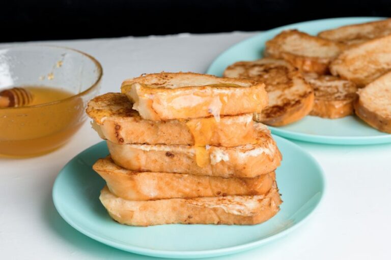 Stack of French Toast With Honey as a Topping