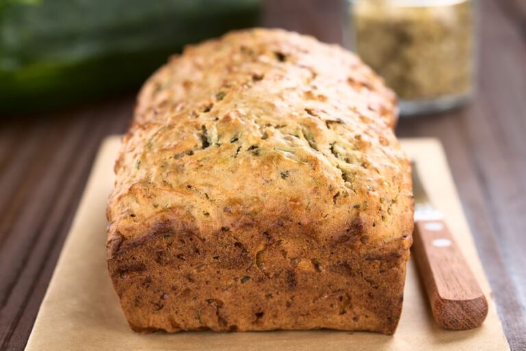 Fresh Baked Loaf of Zucchini Bread Ready to Be Cut