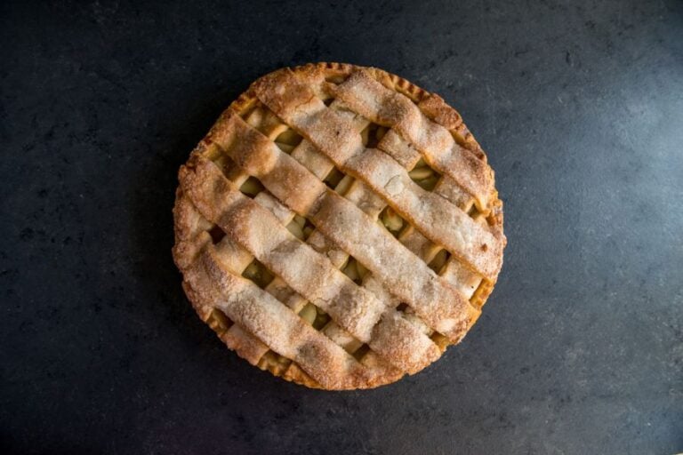 Homemade Lattice Apple Pie on a Slate Surface
