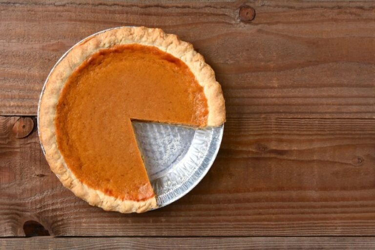 Top View of a Pumpkin Pie on a Wooden Table