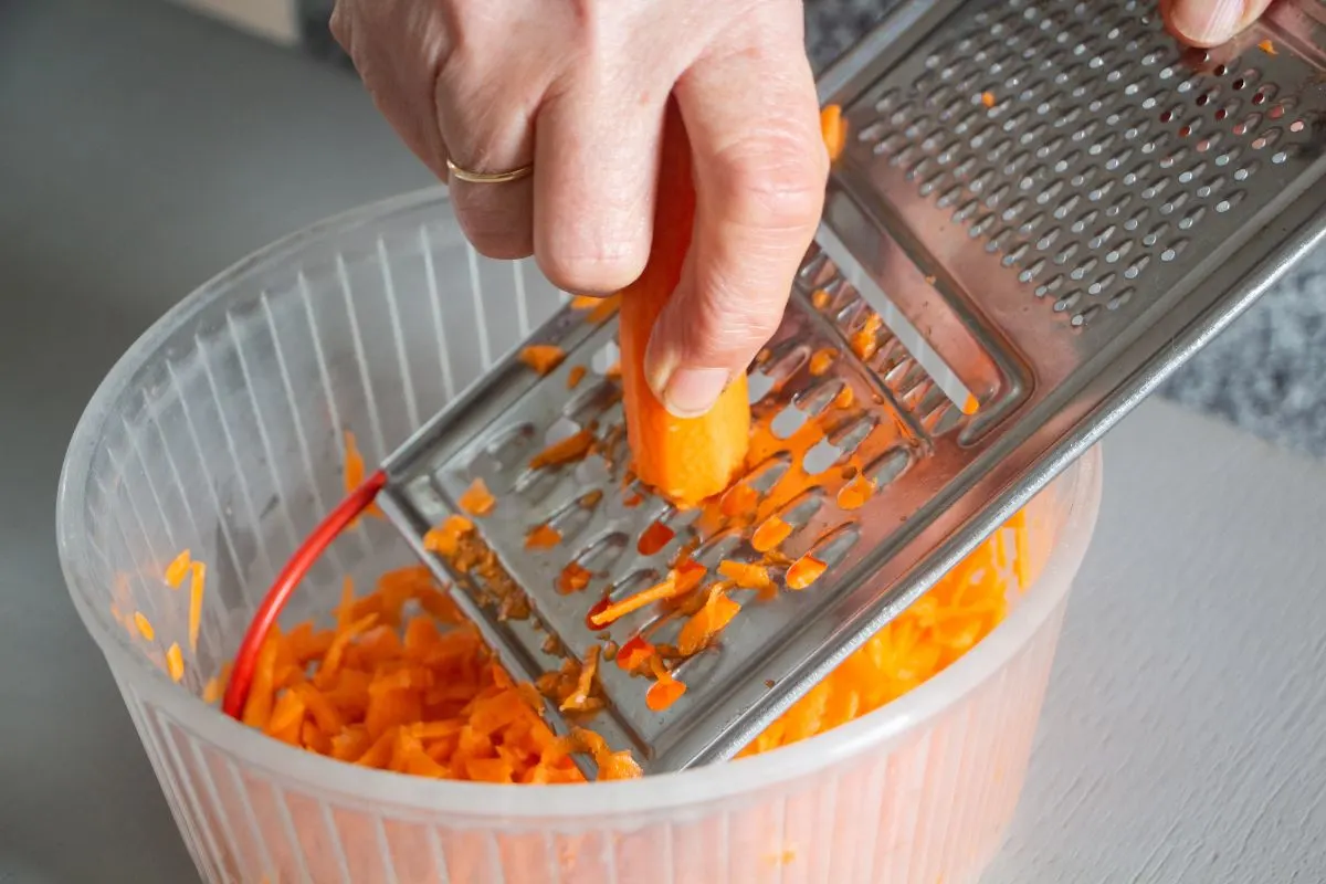 Grating Carrots Into a Bowl