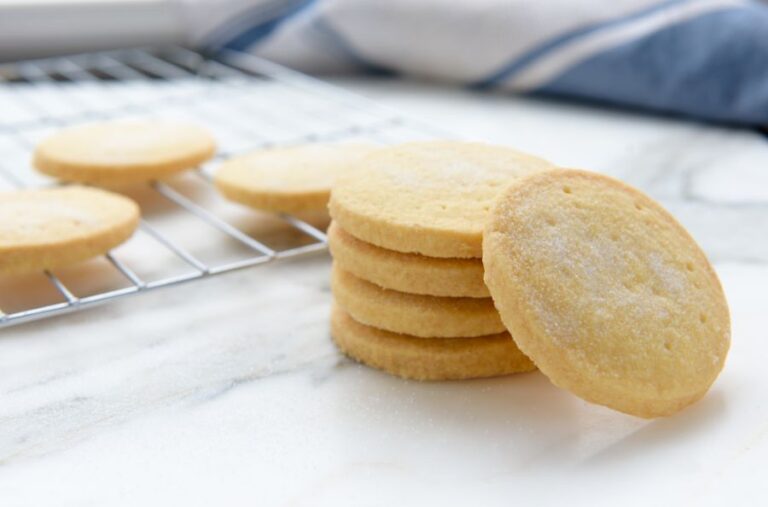Round Shortbread Cookies in a Stack and on a Cooling Rack
