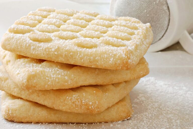 Freshly Baked Shortbread Cookies With a Sprinkle of Powdered Sugar