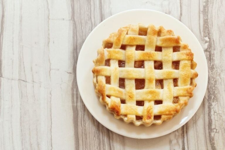 Lattice Crust Apple Pie on a White Plate