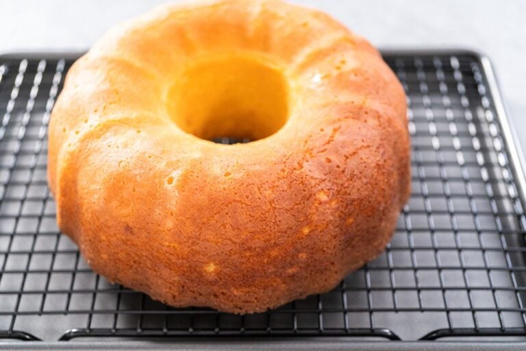 A Lemon Cranberry Bundt Cake on a Cooling Rack