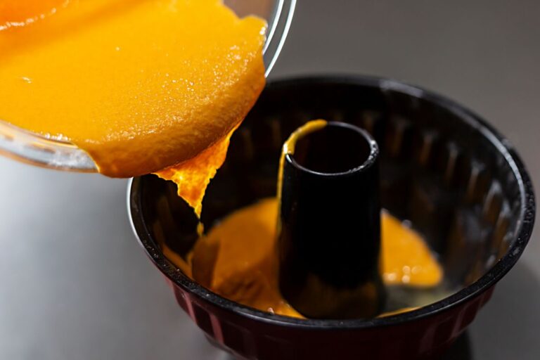 Filling a Bundt Pan with Carrot Cake Batter