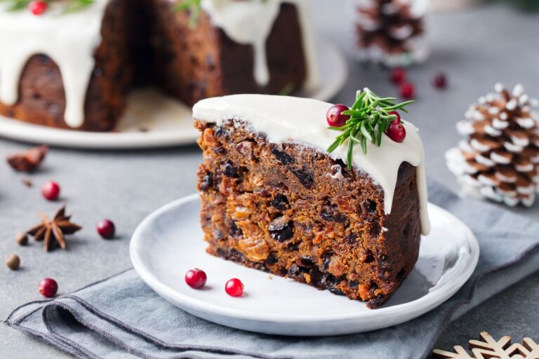 Slice of Christmas Fruit Cake With Frosting