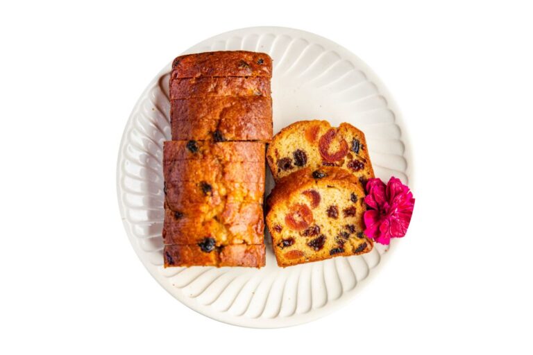 Sliced Fruit Cake on a White Plate