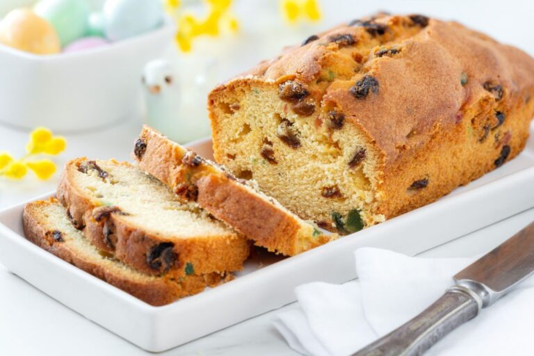 Sliced Fruit Cake on a White Serving Dish