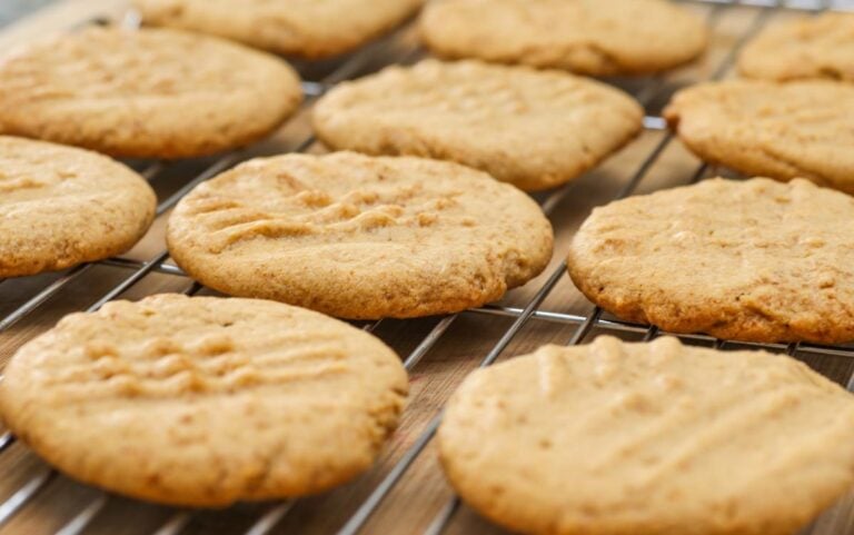 Flat Peanut Butter Cookies Cooling on a Rack