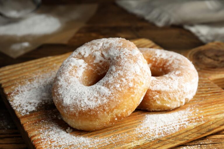 Fresh Baked Donuts on a Small Cutting Board