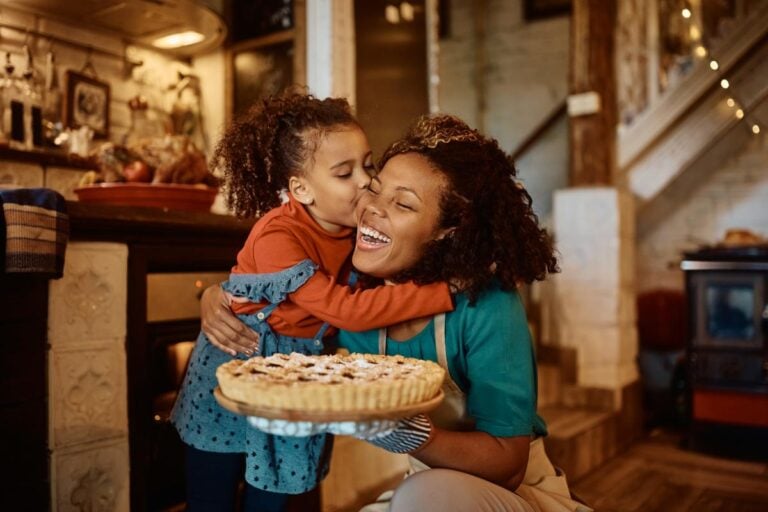 A mother and daughter baking together