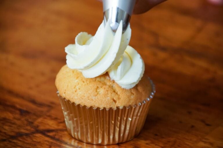 Frosting a cupcake