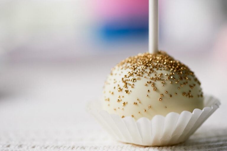 A cake pop with gold flakes