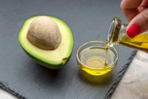 Pouring avocado oil